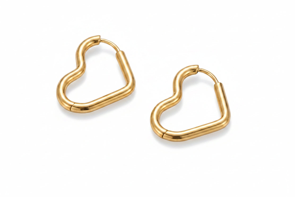 Gold hoop earrings on a white background